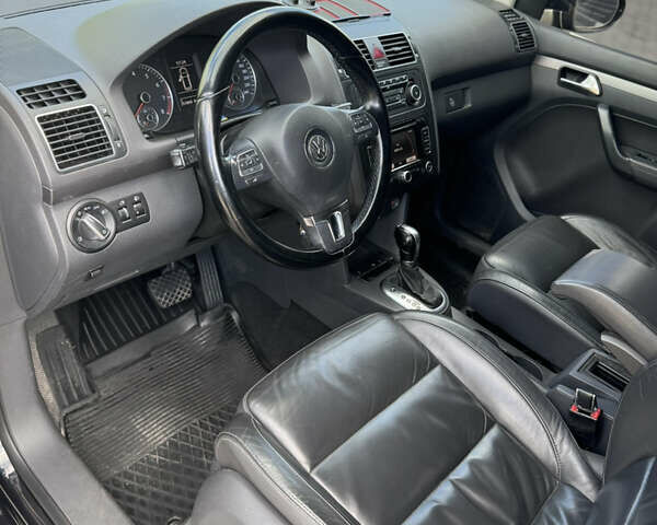 Черный Фольксваген Туран, объемом двигателя 1.39 л и пробегом 251 тыс. км за 7200 $, фото 4 на Automoto.ua