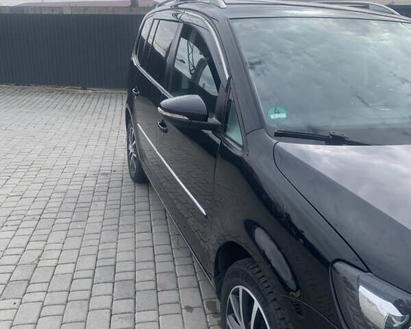 Черный Фольксваген Туран, объемом двигателя 1.97 л и пробегом 205 тыс. км за 12500 $, фото 2 на Automoto.ua