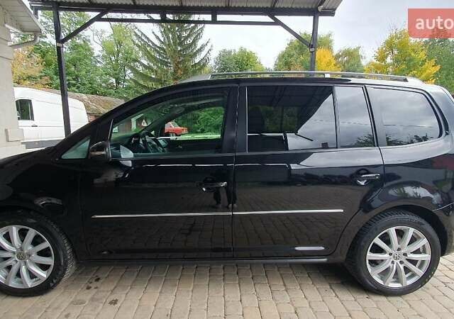 Черный Фольксваген Туран, объемом двигателя 1.98 л и пробегом 255 тыс. км за 12400 $, фото 24 на Automoto.ua