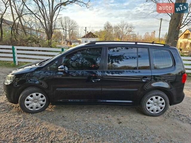 Черный Фольксваген Туран, объемом двигателя 1.6 л и пробегом 275 тыс. км за 9600 $, фото 2 на Automoto.ua