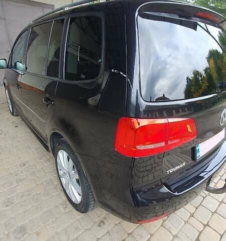 Черный Фольксваген Туран, объемом двигателя 1.98 л и пробегом 255 тыс. км за 12400 $, фото 21 на Automoto.ua