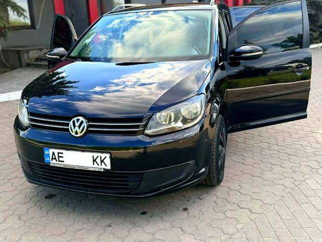 Черный Фольксваген Туран, объемом двигателя 1.4 л и пробегом 251 тыс. км за 8200 $, фото 1 на Automoto.ua