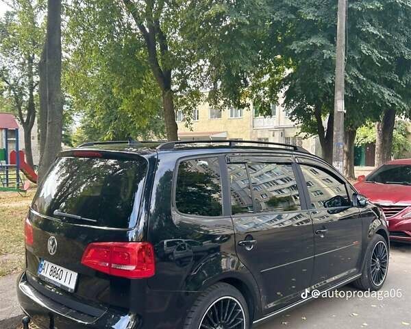 Черный Фольксваген Туран, объемом двигателя 1.6 л и пробегом 268 тыс. км за 9300 $, фото 3 на Automoto.ua