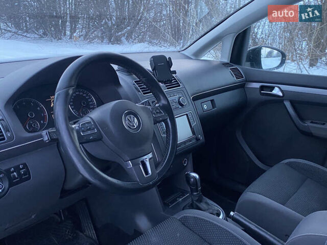 Черный Фольксваген Туран, объемом двигателя 1.39 л и пробегом 213 тыс. км за 9700 $, фото 8 на Automoto.ua