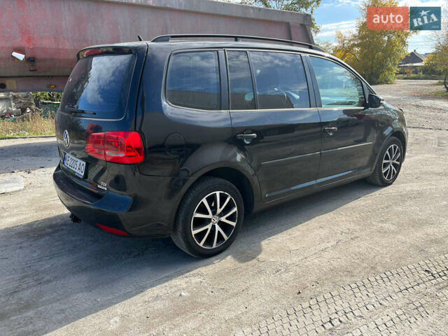 Черный Фольксваген Туран, объемом двигателя 1.6 л и пробегом 280 тыс. км за 9300 $, фото 3 на Automoto.ua