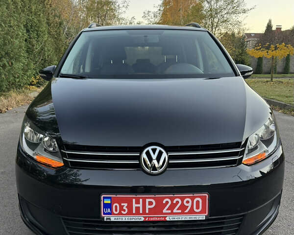 Черный Фольксваген Туран, объемом двигателя 1.6 л и пробегом 185 тыс. км за 11300 $, фото 6 на Automoto.ua