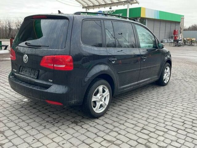 Черный Фольксваген Туран, объемом двигателя 1.6 л и пробегом 333 тыс. км за 8900 $, фото 2 на Automoto.ua