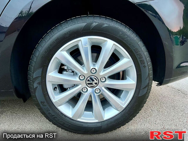 Черный Фольксваген Туран, объемом двигателя 2 л и пробегом 229 тыс. км за 12999 $, фото 2 на Automoto.ua