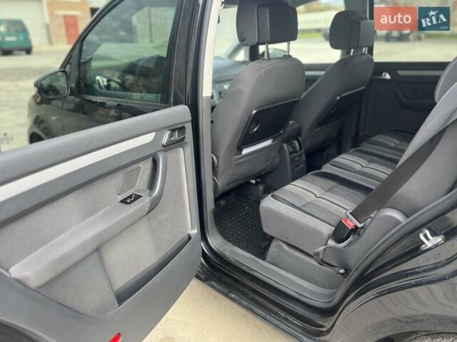 Черный Фольксваген Туран, объемом двигателя 1.97 л и пробегом 213 тыс. км за 11600 $, фото 10 на Automoto.ua