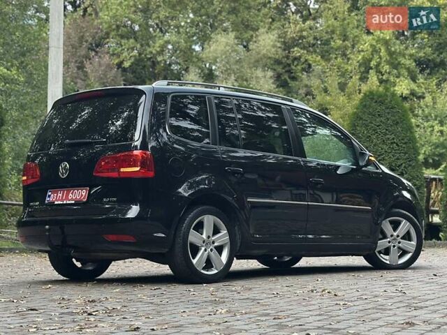 Черный Фольксваген Туран, объемом двигателя 2 л и пробегом 200 тыс. км за 11850 $, фото 96 на Automoto.ua