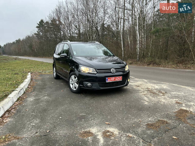 Чорний Фольксваген Туран, об'ємом двигуна 2 л та пробігом 262 тис. км за 12250 $, фото 1 на Automoto.ua
