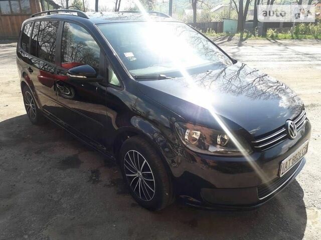 Чорний Фольксваген Туран, об'ємом двигуна 1.6 л та пробігом 211 тис. км за 11028 $, фото 1 на Automoto.ua
