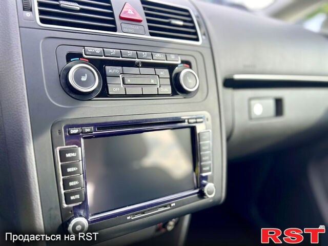 Черный Фольксваген Туран, объемом двигателя 2 л и пробегом 229 тыс. км за 12999 $, фото 12 на Automoto.ua