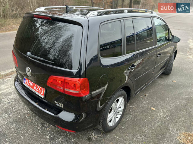 Чорний Фольксваген Туран, об'ємом двигуна 2 л та пробігом 262 тис. км за 12250 $, фото 110 на Automoto.ua