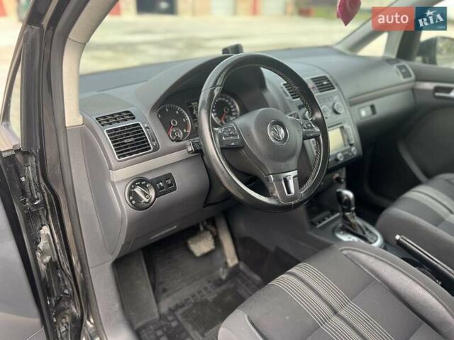 Черный Фольксваген Туран, объемом двигателя 1.97 л и пробегом 213 тыс. км за 11600 $, фото 7 на Automoto.ua