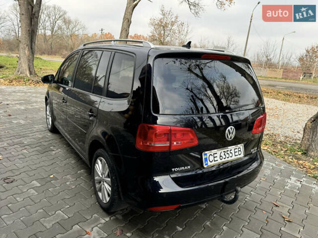 Чорний Фольксваген Туран, об'ємом двигуна 2 л та пробігом 255 тис. км за 12800 $, фото 5 на Automoto.ua