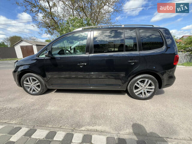 Чорний Фольксваген Туран, об'ємом двигуна 1.6 л та пробігом 228 тис. км за 11999 $, фото 4 на Automoto.ua