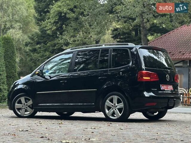 Черный Фольксваген Туран, объемом двигателя 2 л и пробегом 200 тыс. км за 11850 $, фото 88 на Automoto.ua