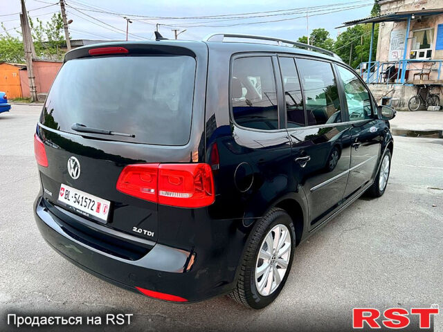 Черный Фольксваген Туран, объемом двигателя 2 л и пробегом 229 тыс. км за 12999 $, фото 4 на Automoto.ua