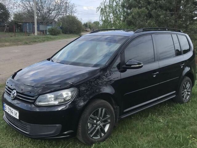 Чорний Фольксваген Туран, об'ємом двигуна 1.4 л та пробігом 280 тис. км за 11000 $, фото 1 на Automoto.ua