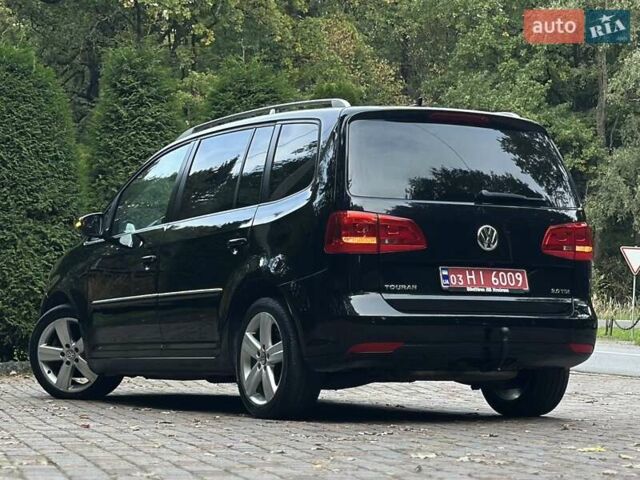 Черный Фольксваген Туран, объемом двигателя 2 л и пробегом 200 тыс. км за 11850 $, фото 3 на Automoto.ua
