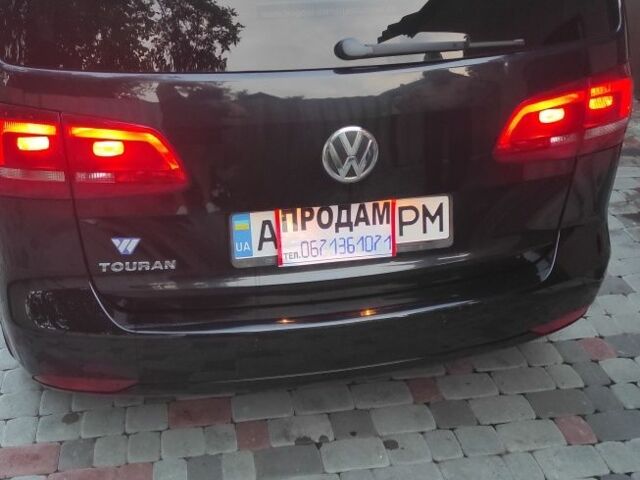 Черный Фольксваген Туран, объемом двигателя 2 л и пробегом 200 тыс. км за 12800 $, фото 2 на Automoto.ua