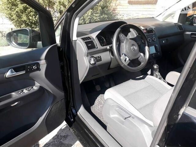 Чорний Фольксваген Туран, об'ємом двигуна 1.6 л та пробігом 211 тис. км за 11028 $, фото 3 на Automoto.ua