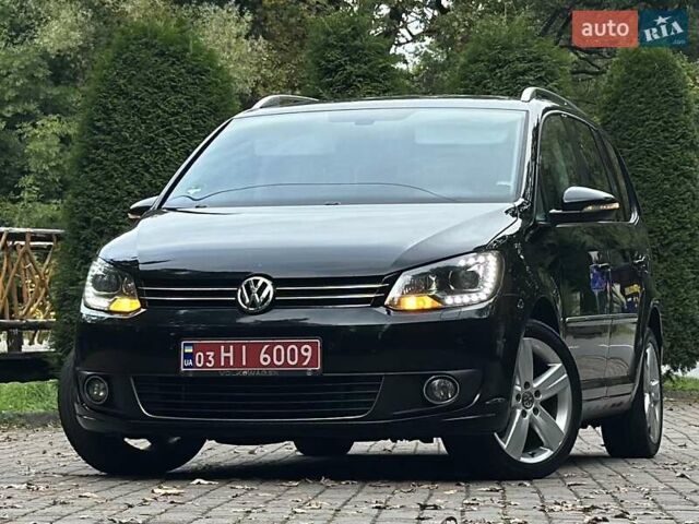 Черный Фольксваген Туран, объемом двигателя 2 л и пробегом 200 тыс. км за 11850 $, фото 72 на Automoto.ua