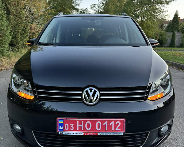 Черный Фольксваген Туран, объемом двигателя 1.6 л и пробегом 162 тыс. км за 11850 $, фото 2 на Automoto.ua