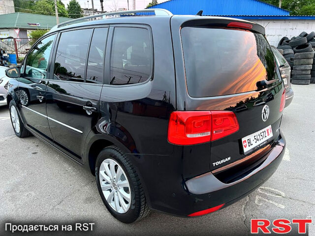 Черный Фольксваген Туран, объемом двигателя 2 л и пробегом 229 тыс. км за 12999 $, фото 3 на Automoto.ua