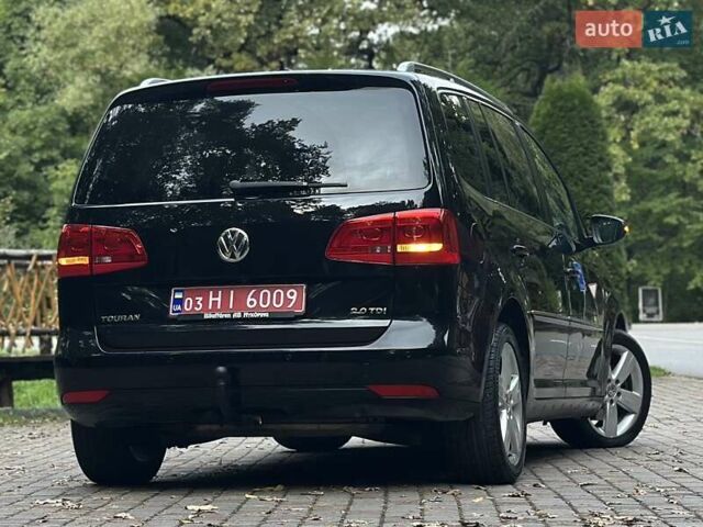 Черный Фольксваген Туран, объемом двигателя 2 л и пробегом 200 тыс. км за 11850 $, фото 93 на Automoto.ua