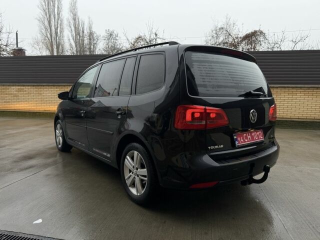 Черный Фольксваген Туран, объемом двигателя 1.6 л и пробегом 218 тыс. км за 9950 $, фото 3 на Automoto.ua