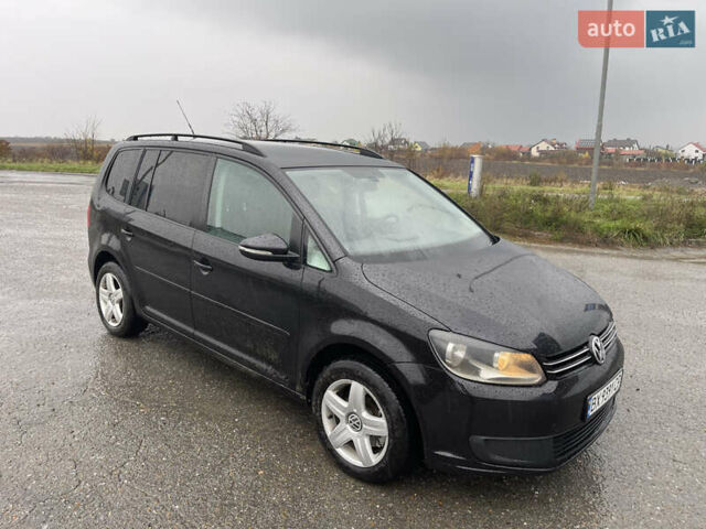 Чорний Фольксваген Туран, об'ємом двигуна 1.39 л та пробігом 230 тис. км за 7999 $, фото 1 на Automoto.ua