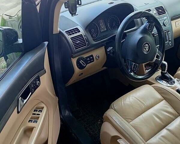 Черный Фольксваген Туран, объемом двигателя 1.4 л и пробегом 220 тыс. км за 9400 $, фото 8 на Automoto.ua