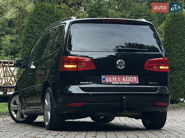 Черный Фольксваген Туран, объемом двигателя 2 л и пробегом 200 тыс. км за 11850 $, фото 86 на Automoto.ua