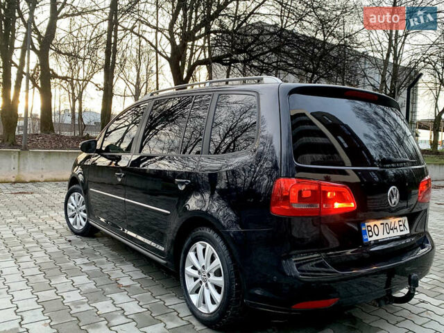 Черный Фольксваген Туран, объемом двигателя 2 л и пробегом 190 тыс. км за 11799 $, фото 2 на Automoto.ua