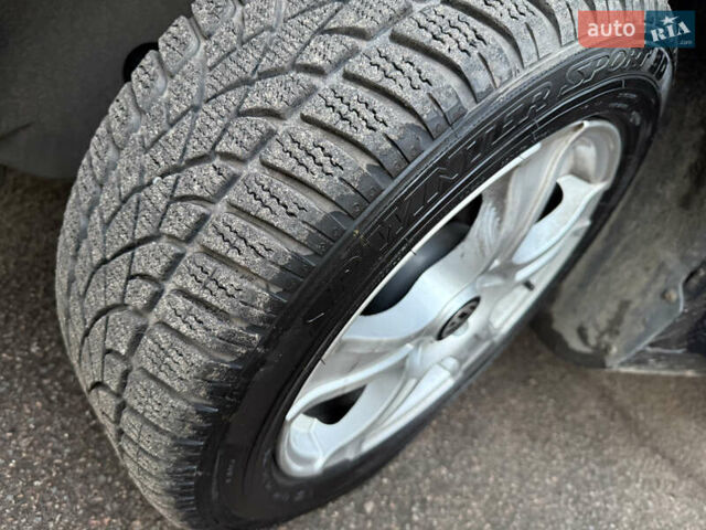 Черный Фольксваген Туран, объемом двигателя 1.6 л и пробегом 236 тыс. км за 9750 $, фото 37 на Automoto.ua