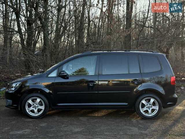 Черный Фольксваген Туран, объемом двигателя 1.6 л и пробегом 236 тыс. км за 9750 $, фото 1 на Automoto.ua