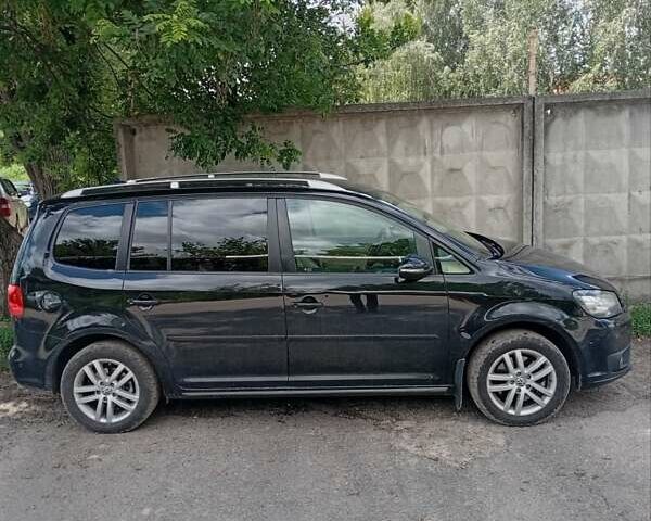 Черный Фольксваген Туран, объемом двигателя 1.4 л и пробегом 220 тыс. км за 9400 $, фото 7 на Automoto.ua