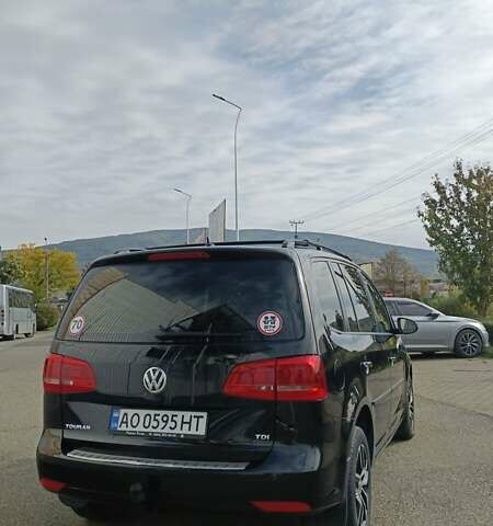 Черный Фольксваген Туран, объемом двигателя 1.97 л и пробегом 101 тыс. км за 12500 $, фото 4 на Automoto.ua