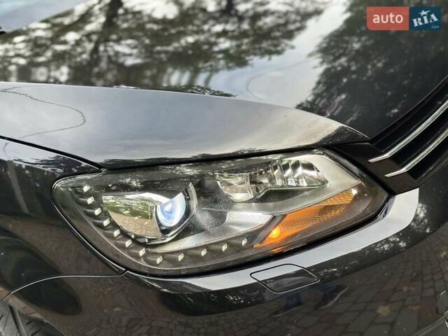 Черный Фольксваген Туран, объемом двигателя 2 л и пробегом 200 тыс. км за 11850 $, фото 2 на Automoto.ua