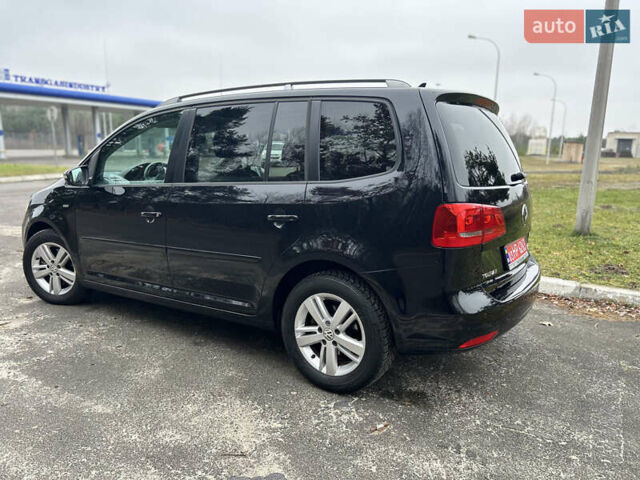 Чорний Фольксваген Туран, об'ємом двигуна 2 л та пробігом 262 тис. км за 12250 $, фото 107 на Automoto.ua