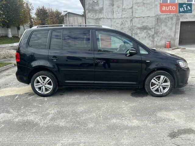 Черный Фольксваген Туран, объемом двигателя 1.97 л и пробегом 213 тыс. км за 11600 $, фото 14 на Automoto.ua