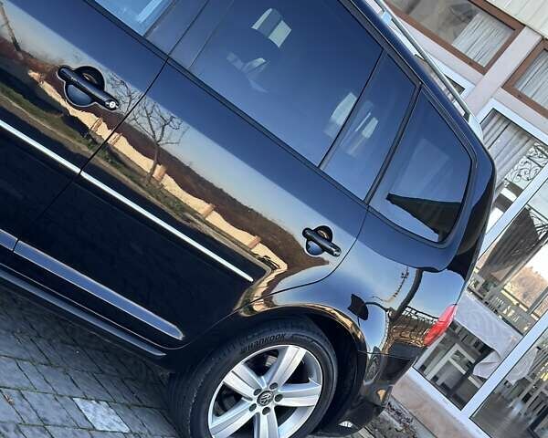 Черный Фольксваген Туран, объемом двигателя 2 л и пробегом 200 тыс. км за 11777 $, фото 7 на Automoto.ua