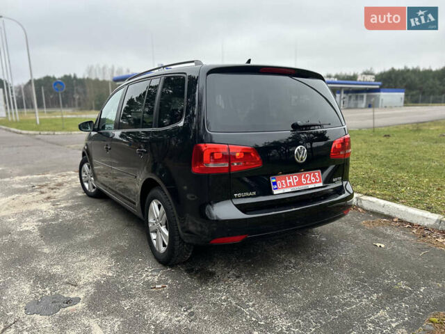 Чорний Фольксваген Туран, об'ємом двигуна 2 л та пробігом 262 тис. км за 12250 $, фото 108 на Automoto.ua