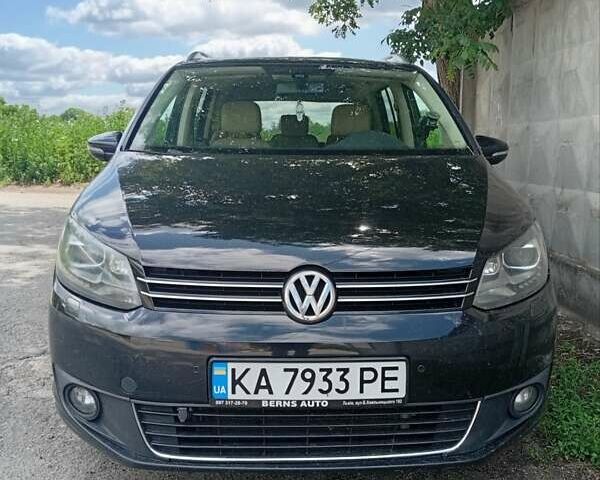 Черный Фольксваген Туран, объемом двигателя 1.4 л и пробегом 220 тыс. км за 9400 $, фото 2 на Automoto.ua