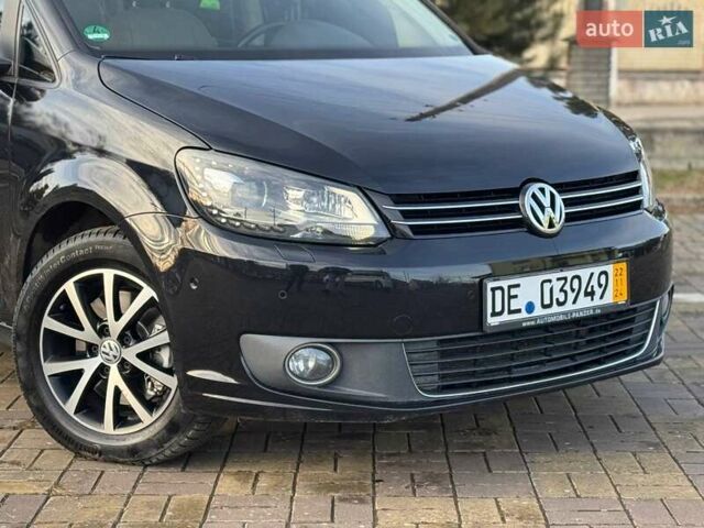Чорний Фольксваген Туран, об'ємом двигуна 2 л та пробігом 172 тис. км за 14500 $, фото 14 на Automoto.ua