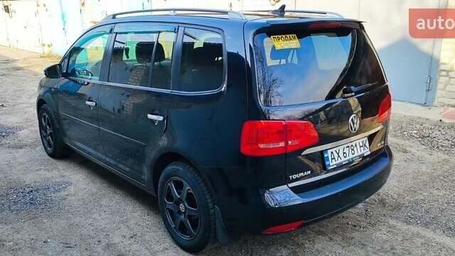 Черный Фольксваген Туран, объемом двигателя 2 л и пробегом 234 тыс. км за 12400 $, фото 6 на Automoto.ua