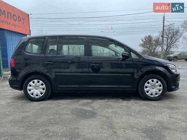 Чорний Фольксваген Туран, об'ємом двигуна 1.6 л та пробігом 231 тис. км за 11800 $, фото 1 на Automoto.ua