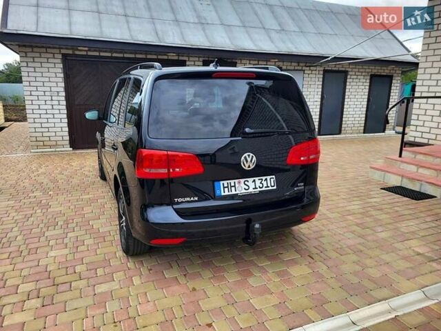 Черный Фольксваген Туран, объемом двигателя 1.6 л и пробегом 204 тыс. км за 11950 $, фото 13 на Automoto.ua